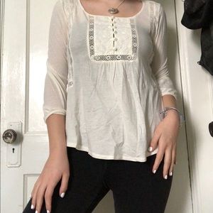 Cream blouse with floral designs